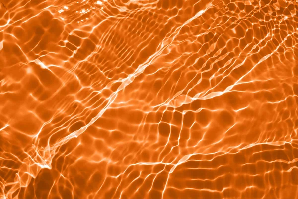 Defocus Blurred Transparent Red Orange Colored Clear Calm Water Surface — Stock Photo, Image