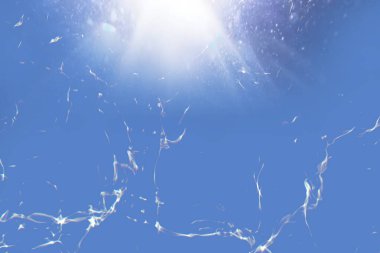 Defocus blurred transparent blue colored clear calm water surface texture with splashes and bubbles. Trendy abstract nature background. Water waves in sunlight with copy space. Blue water shine