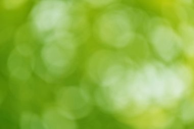 Defocus blurred transparent blue colored clear calm water surface texture with splashes and bubbles. Trendy abstract nature background. Water waves in sunlight with copy space. Blue water shine