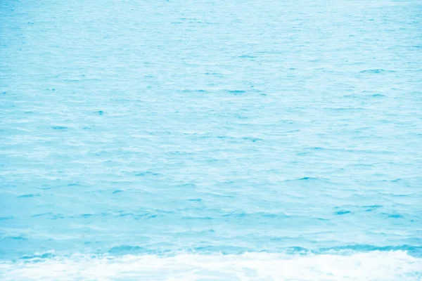 Defocus Blurred Transparent Blue Colored Clear Calm Water Surface Texture — Foto de Stock