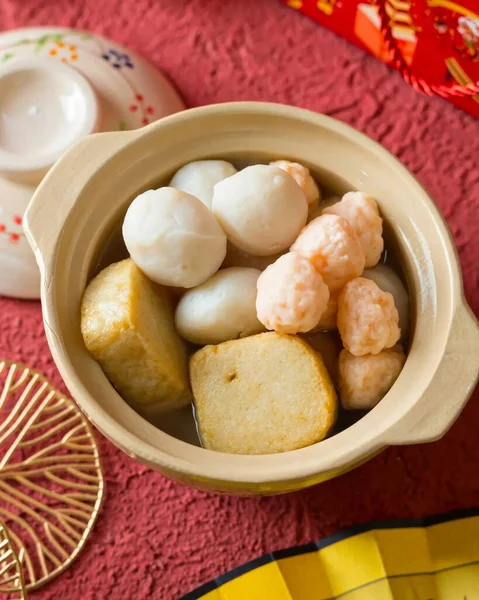 Jakarta, Indonesia - Jan 17, 2023 : Delicious fried meatballs, suitable to be given to relatives during Chinese New Year with a special Chinese New Year background. Lunar New Year concept.