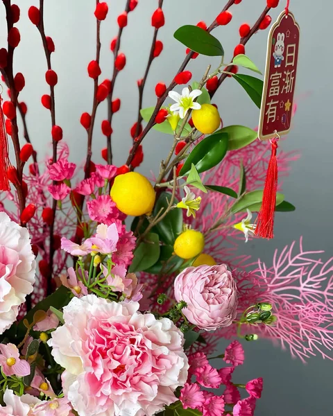 Jakarta, Indonesia - Jan 17, 2023 : bouquet of flowers ready to be sent to celebrate Chinese New Year. Religious holiday concept.