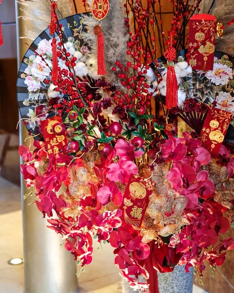 Jakarta, Indonesia - Jan 17, 2023 : bouquet of flowers ready to be sent to celebrate Chinese New Year. Religious holiday concept.