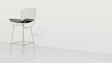 Siyah minderli beyaz bir sandalye beyaz bir duvarda oturuyor. Sandalye metalden yapılmıştır ve bir ağ tasarımına sahiptir. Sandalye modern ve şık, minimalist bir tasarımı var.