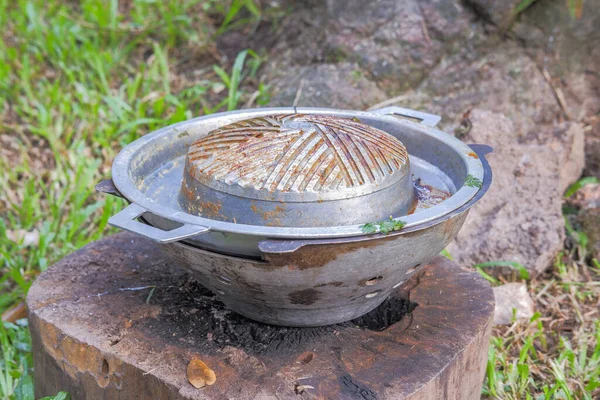 stock image Charcoal pans can be eaten both grilled and sukiyaki. After use, place it on a wooden plate.