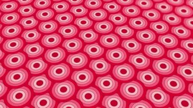 animated abstract pattern with geometric elements in pink tones gradient background