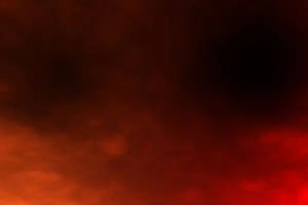 Оранжево Красные Облака Дыма Движутся Турбулентно Оранжево Красном Фоне — стоковое фото