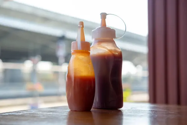 stock image A bottle of breakfast sauce sits on the table.