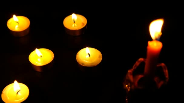 Many Candles Lit Black Background Burning Candles Dark Tablememory Stock Video