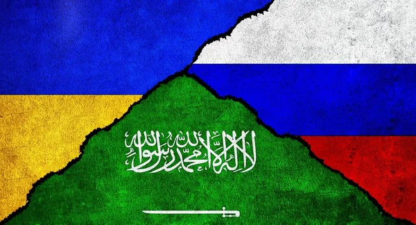 Russia, Ukraine and Saudi Arabia flag together on wall. Diplomatic relations between Russia, Saudi Arabia and Ukraine