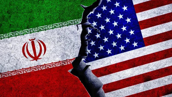 stock image USA and Iran flag together on a cracked wall. Iran and United States of America diplomatic relations