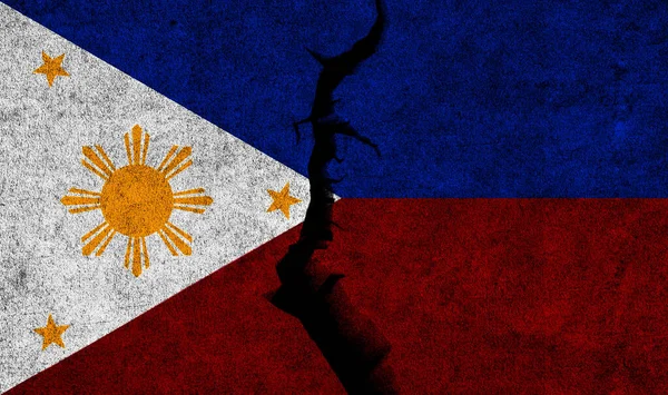 Philippines flag on cracked wall background. Philippines crisis, political division, conflicts concept