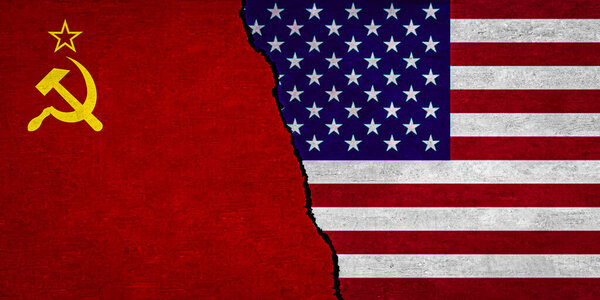 USA and Soviet Union flag together on textured wall. Relations between Soviet Union and United States of America