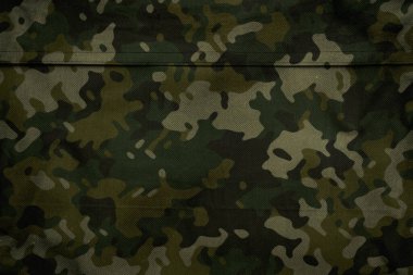 Askeri branda dokusu, ordu kamuflaj tekstil arka planı, kamuflaj kumaş örgüsü deseni
