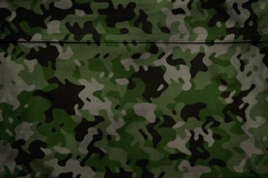 Askeri branda dokusu, ordu kamuflaj tekstil arka planı, kamuflaj kumaş örgüsü deseni