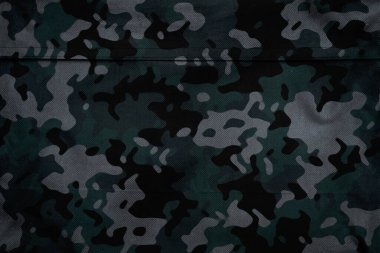 Askeri branda dokusu, ordu kamuflaj tekstil arka planı, kamuflaj kumaş örgüsü deseni