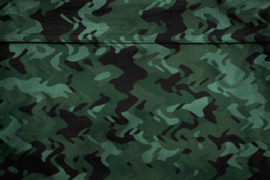 Askeri branda dokusu, ordu kamuflaj tekstil arka planı, kamuflaj kumaş örgüsü deseni