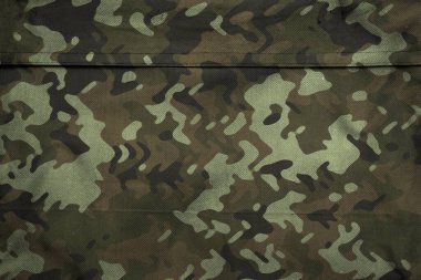 Askeri branda dokusu, ordu kamuflaj tekstil arka planı, kamuflaj kumaş örgüsü deseni