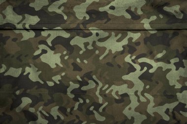 Askeri branda dokusu, ordu kamuflaj tekstil arka planı, kamuflaj kumaş örgüsü deseni