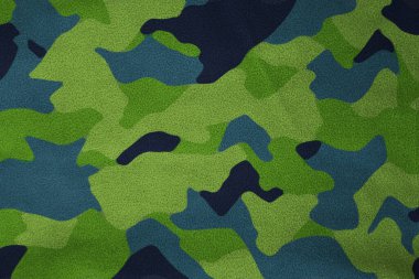 Açık hava kamuflaj örgüsü, askeri branda deseni, kamuflaj kumaşı dokusu, ordu tuvali arka planı.