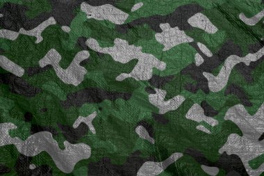 Askeri kamuflaj deseni, av ve boya topu örtüsü, renkli hava geçirmez kamuflaj örgüsü, ordu kamuflaj tekstil arka planı.