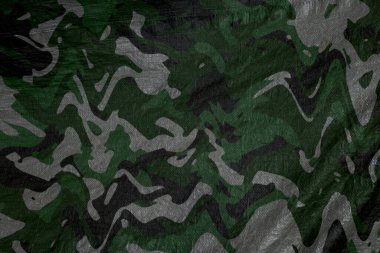 Askeri kamuflaj deseni, av ve boya topu örtüsü, renkli hava geçirmez kamuflaj örgüsü, ordu kamuflaj tekstil arka planı.