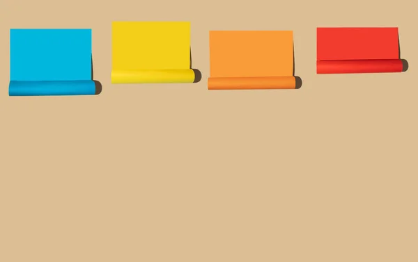 Kıvrımlı mavi, sarı, turuncu, kırmızı kağıt çarşaflar, bej arka planda izole..