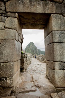 Machu Picchu 'daki İnka mimarisinin ayrıntıları. Antik taş bina tekniğini kapatın.