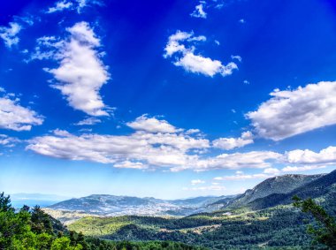 Cloudy blue sky over country land, Central Greece