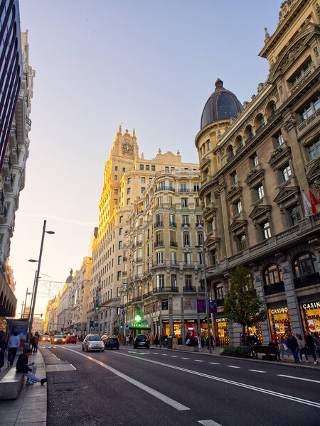 Madrid, Spain - November 19, 2023: Gran Via view in sunset colors
