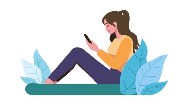 Yerde oturan genç bir kadın. Telefonu kullanıyor.