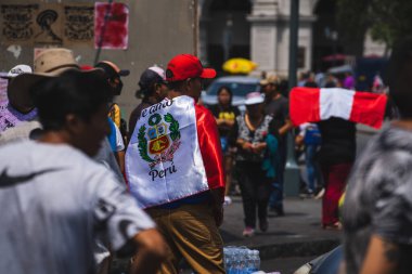Lima, Peru - January 20, 2023: Political Protests and demonstrations with flags on the streets of Lima. High quality photo