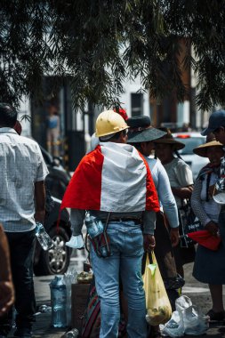 Lima, Peru - January 20, 2023: Political Protests and demonstrations with flags on the streets of Lima. High quality photo