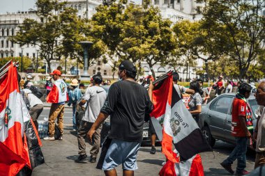 Lima, Peru - January 20, 2023: Political Protests and demonstrations with flags on the streets of Lima. High quality photo