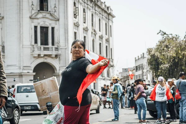 Lima, Peru - January 20, 2023: Political Protests and demonstrations with flags on the streets of Lima. High quality photo