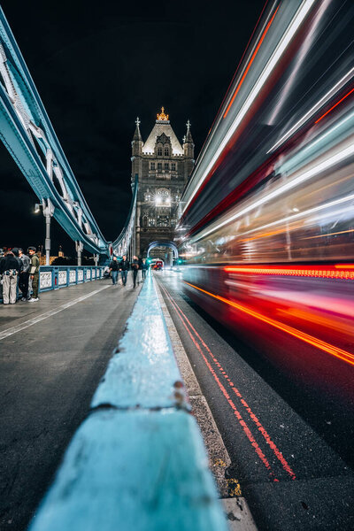 London Bridge over Thames in London by night with light trails long exposure. High quality photo England United Kingdom