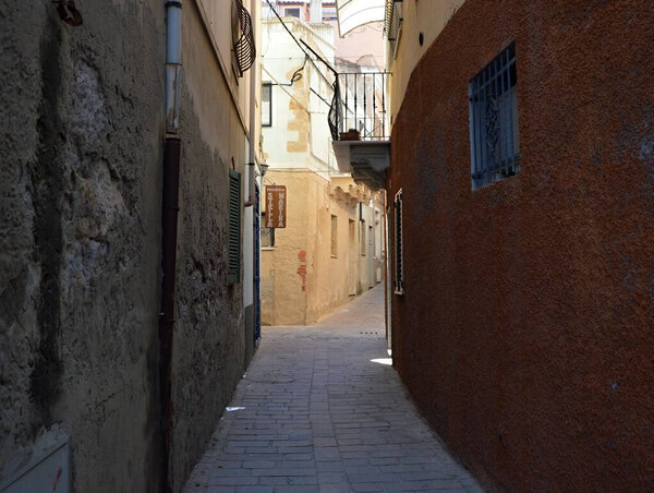 Narrow Street in the Town Carloforte on the Island San Pietro, Sardinia, Italy