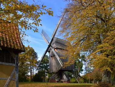 Historical Wind Mill in Autumn in the Town Rethem at the River Aller, Lower Saxony clipart