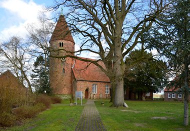 Historical Church in the Village Westen at the River Aller, Lower Saxony clipart