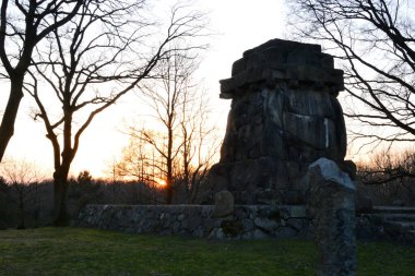 Sunset over the Bismarck Monument in thr Town Walsrode. Lower Saxony clipart