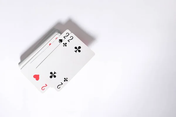card gambling. a deck of cards fanned out on a white background