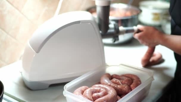 Housewife Fills Sausages Minced Meat Meat Grinder Puts Them Box — Stock Video
