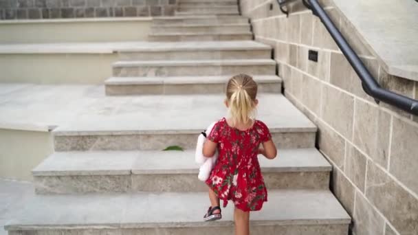 Happy Little Girl Red Day Dress Leisurely Walks Wooden Set — Stock Video