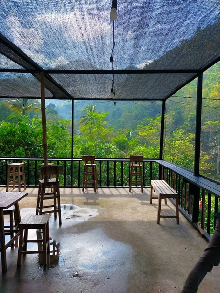 stock image the garden has a table and chairs the green mountain building 