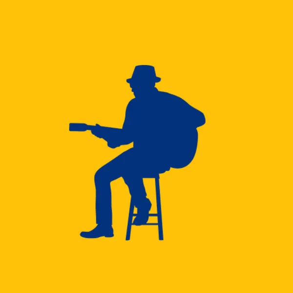 黄色い背景に銃を持った男のシルエット — ストック写真