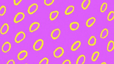 Pembe desenli arka plandaki sarı halkalar soyut