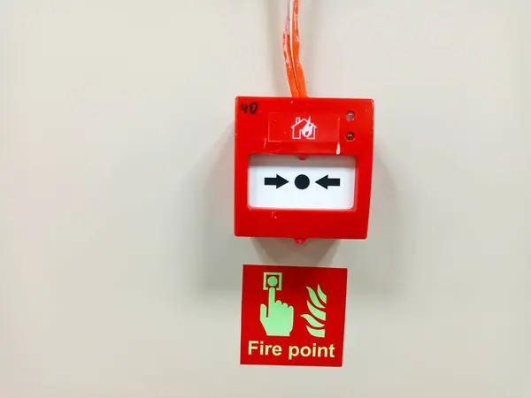 red fire safety button on the wall