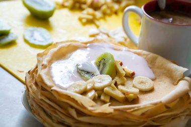 homemade crepes with fruit and yogurt