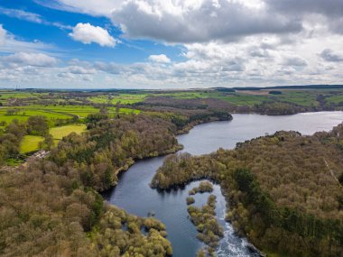 Aerial drone view of Swinsty Reservoir, North Yorkshire. One of Yorkshire Water reservoirs for drinking water supply. clipart