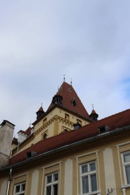 Architecture and details found on buildings in Sighisoara during the day 